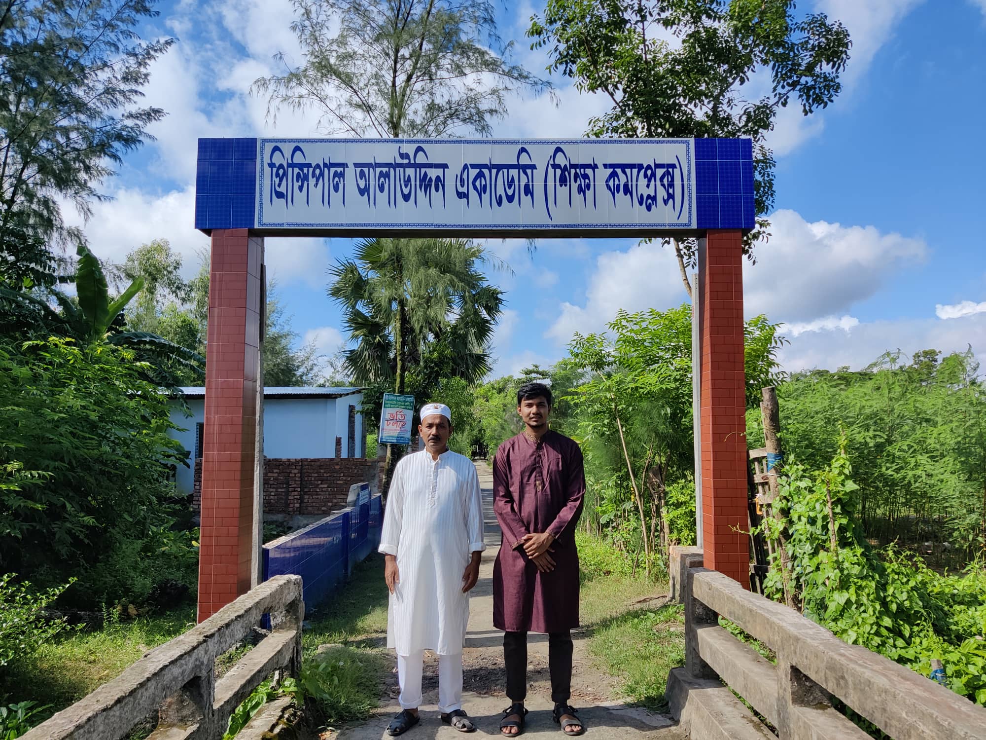 Picture in front of Principal Alauddin Academy